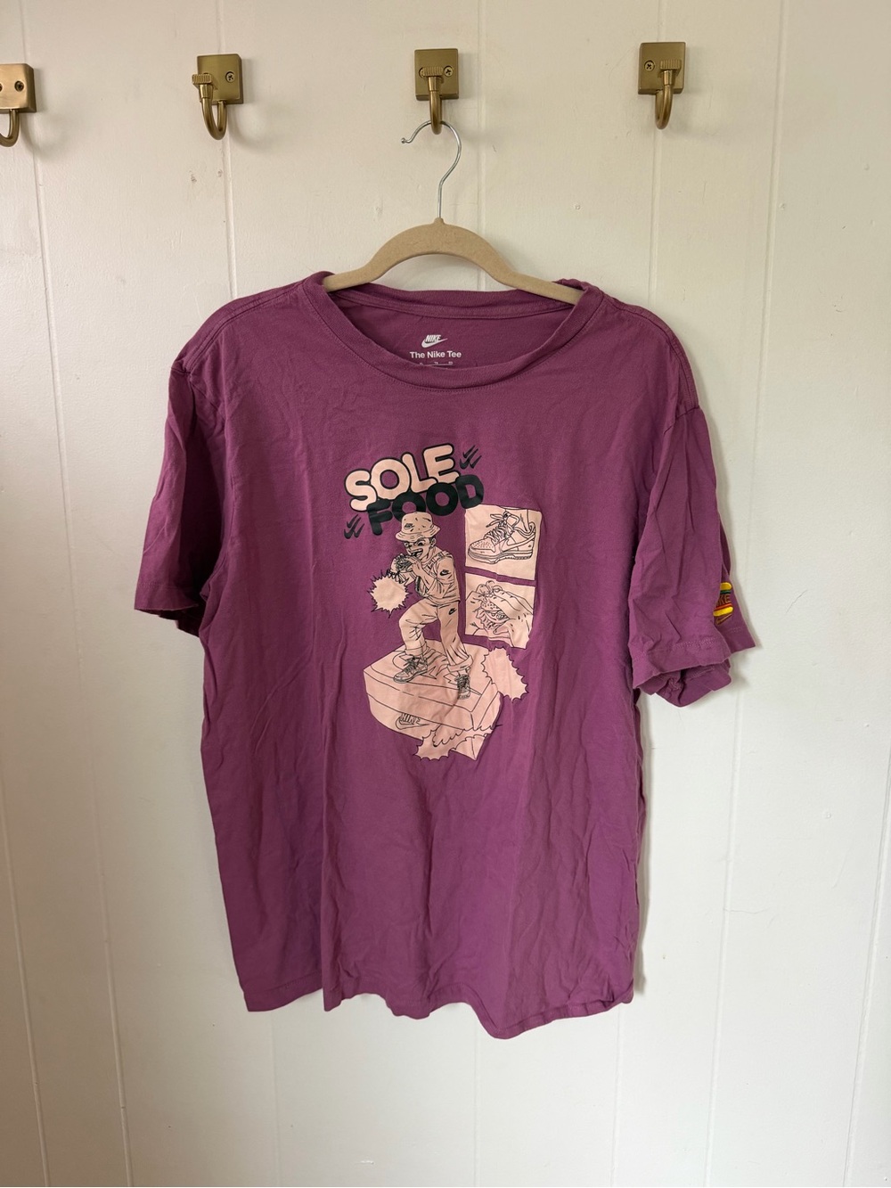 Nike Short Sleeve Graphic Tee in Plum with Peach Accents